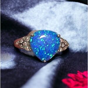 Sterling Silver Pear Shape Blue Lab Opal Clear CZ Ring